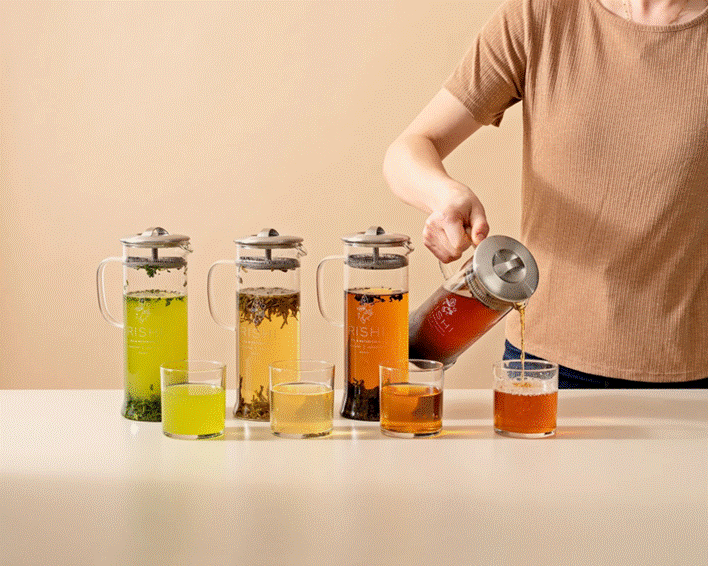 Pouring cold brew tea from a Rishi Simple Brew Loose Leaf Teapot