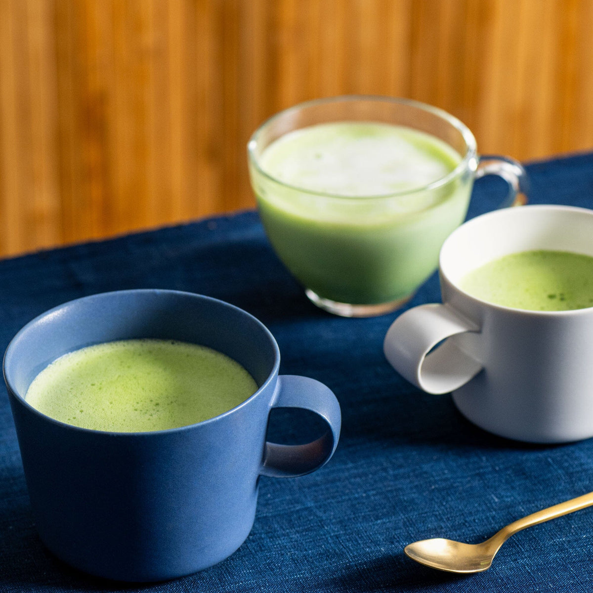 Three cups of Barista Matcha from Rishi Tea & Botanicals are sitting on a table.