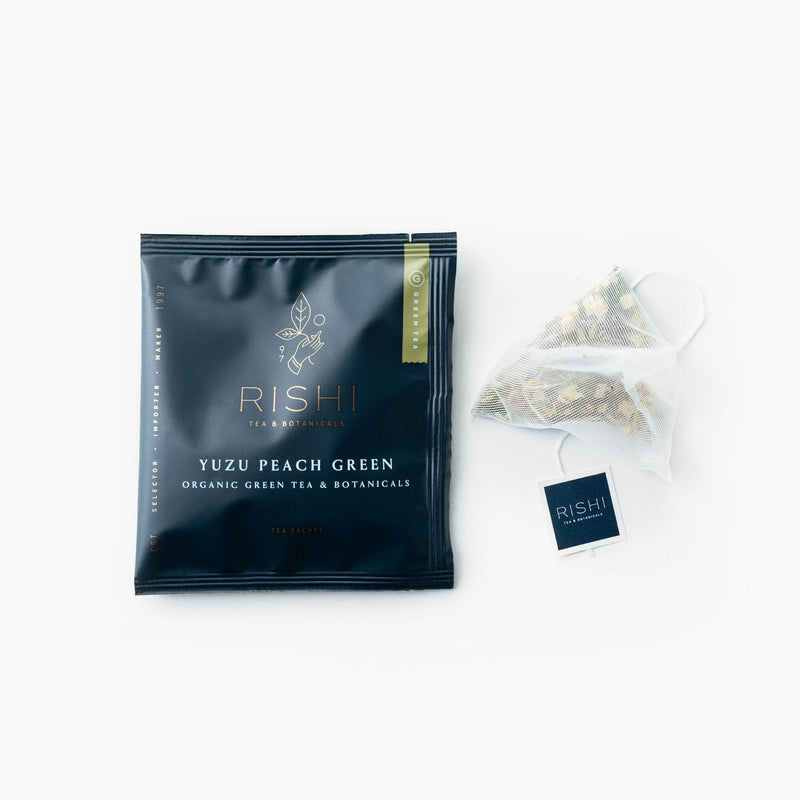 A bag of loose leaf Yuzu Peach Green tea from Rishi Tea & Botanicals.