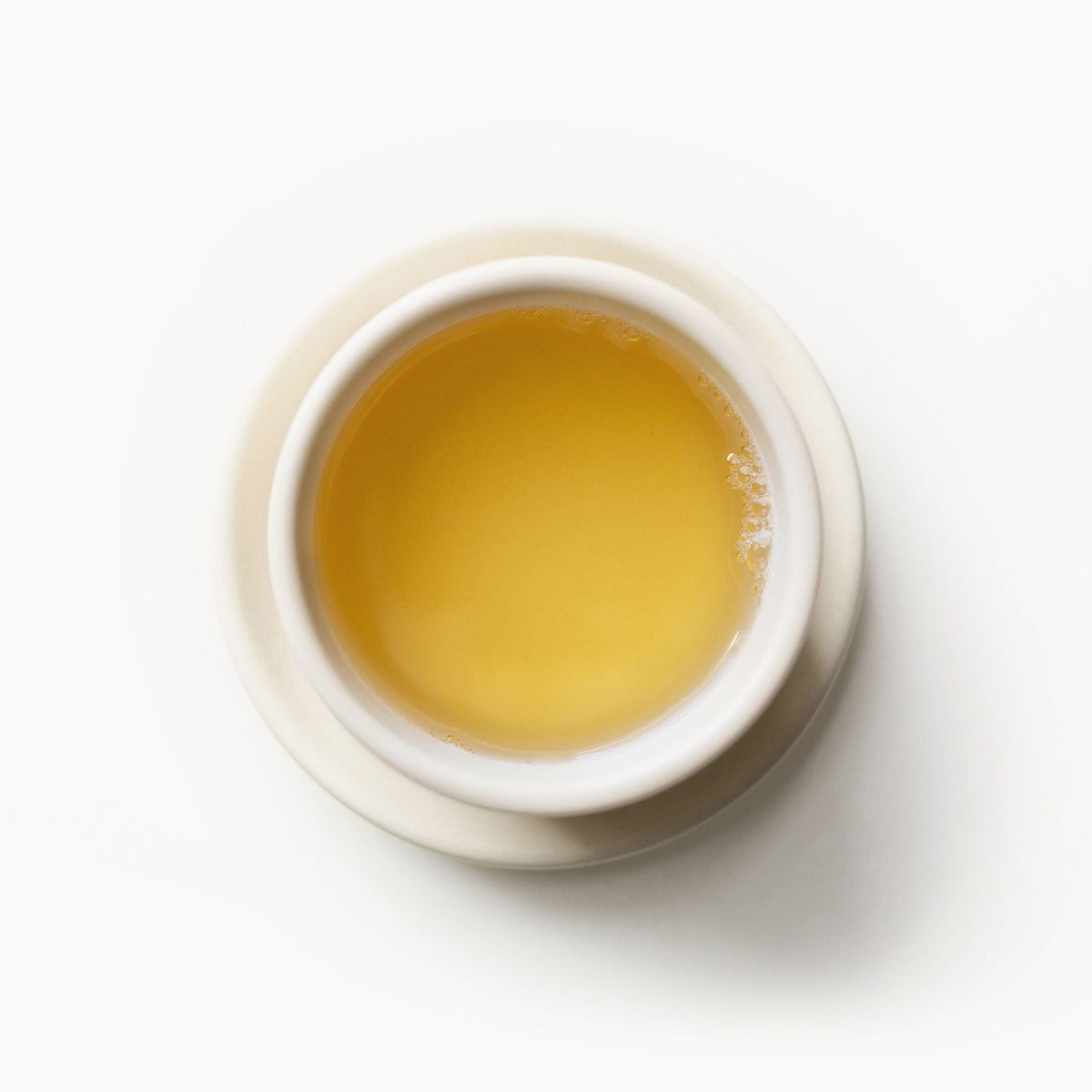 A cup of Greek Mountain Tea on a white background from Rishi Tea & Botanicals.