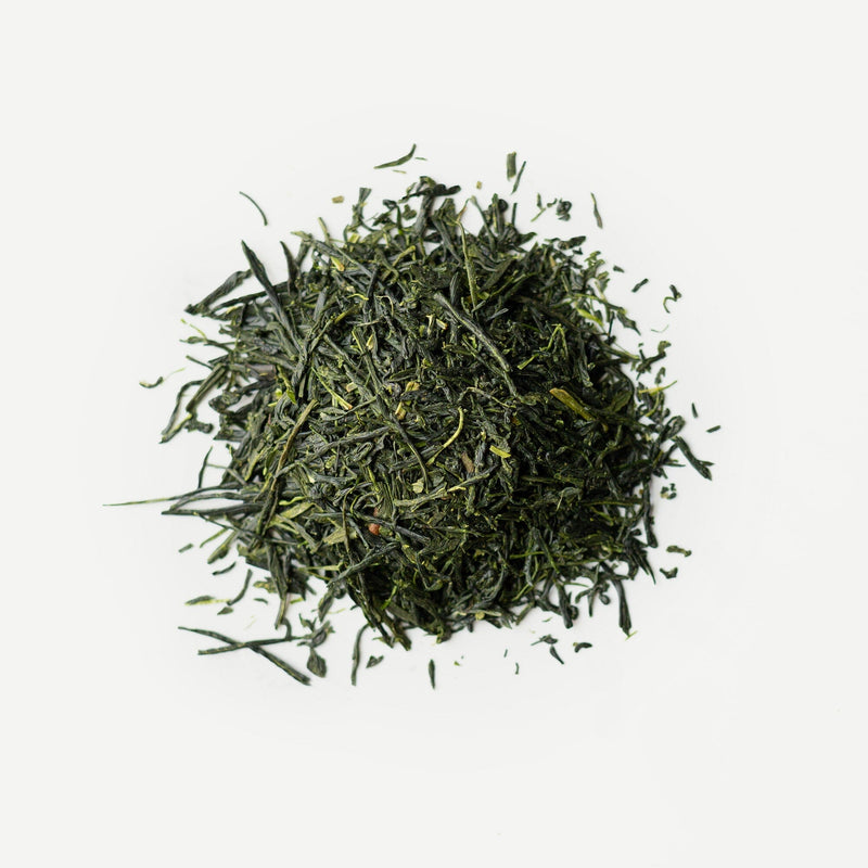 A circle of loose leaf tea on a white background: Rikio-san's Hon Yama Sencha