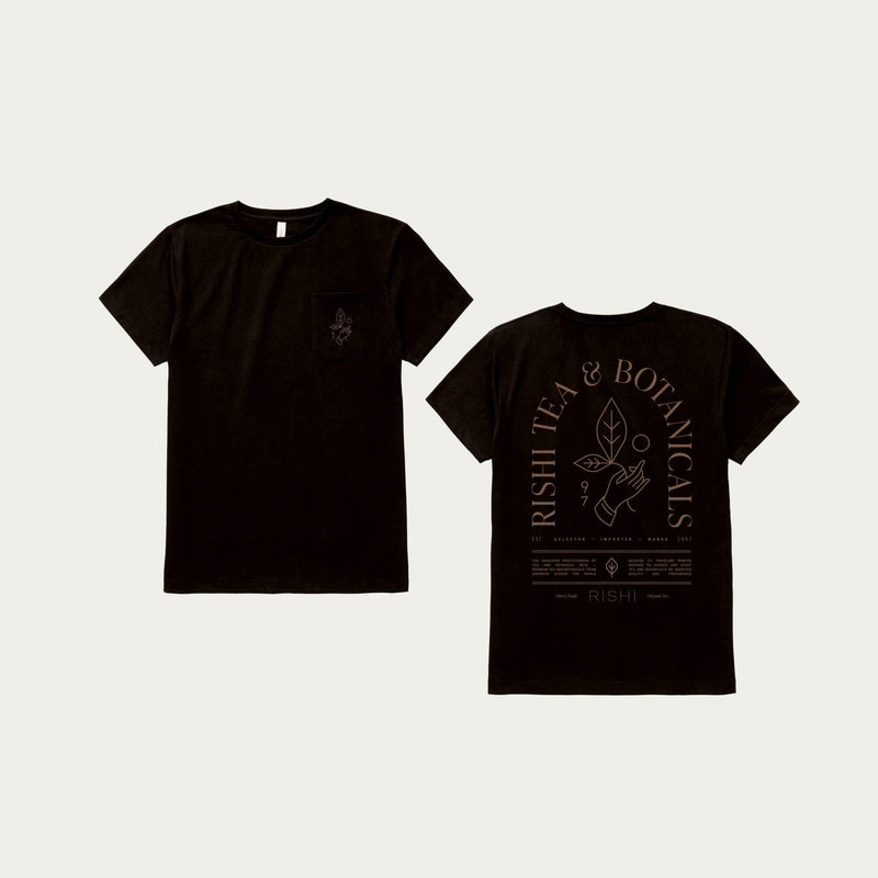 The Rishi Weekend T-Shirt - Black, by Rishi Tea & Botanicals, features a small graphic on the front pocket area and a larger design on the back that says "Rishi Tea & Botanicals" with illustrations and text. Made from organic cotton, it offers unisex sizing for a comfortable, versatile fit.